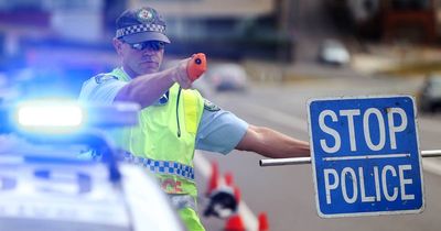 Driver allegedly spat on senior constable and threw beer bottles at cars