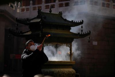 Chinese city seeing half a million Covid cases a day