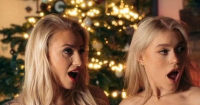 Boxer Ebanie Bridges strips with Elle Brooke under Christmas tree for OnlyFans collab