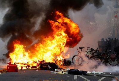 Kurdish protest over Paris shooting turns violent