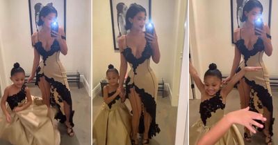 Kylie Jenner and daughter Stormi 'twin' in designer gowns at lavish Kardashian Christmas bash