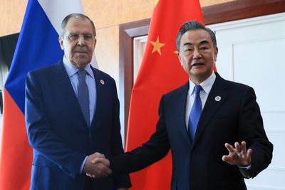 China's foreign minister signals deeper ties with Russia