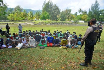 58 Rohingya Muslims land on beach in Indonesia's Aceh