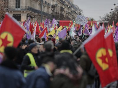 Kurdish people protested in Paris after three were killed in a 'racist' shooting