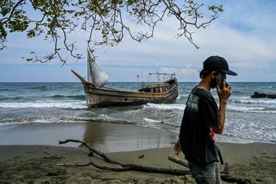 Rohingya refugee boat lands in Indonesia after month at sea