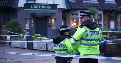 Police hunt gunman after woman killed in Christmas Eve pub shooting
