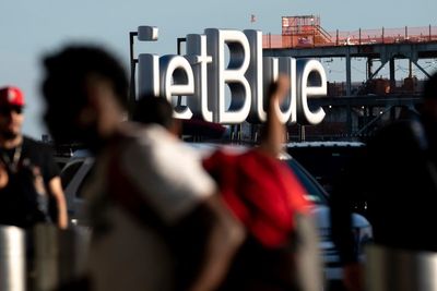 Passenger laptop fire forces plane evacuation at JFK Airport