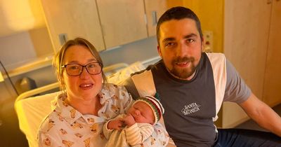 Scottish couple welcome first Christmas Day baby of the year in adorable picture