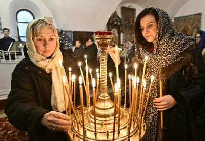 Defying Russia, some Ukrainians embrace Christmas in December