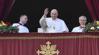 Pope says world suffering from "famine of peace" in annual Christmas message