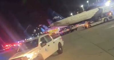 JetBlue flight carrying 127 people evacuated after passenger's phone charger catches fire