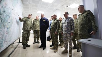 Turkish Defense Minister Visits Syrian Border, Stresses Dialogue