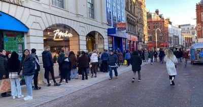 Huge queues outside Lush in Leeds city centre street as shoppers rush to Boxing Day sales