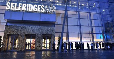 Shoppers queue for three HOURS to bag a Boxing Day bargain in Manchester