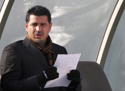 Protest-backing soccer star's family kept from leaving Iran
