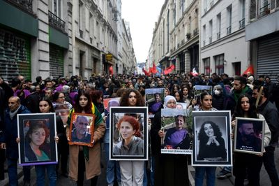 Hundreds march in Paris in tribute to Kurds shot dead
