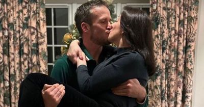 EastEnders legend Natalie Cassidy passionately kisses fiancé in sweet Christmas snap