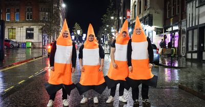 Hundreds hit the town dressed as Teletubbies, traffic cones and whoopee cushions for Wigan's Boxing Day bonanza