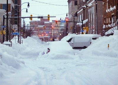 Winter storm Elliott - live: Blizzard kills 56 and grounds 17,000 flights in war zone-like conditions