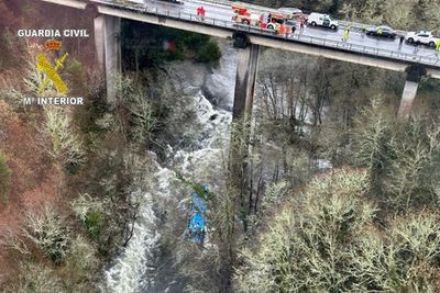 Seven dead after bus plunges off bridge in Spain with just two survivors