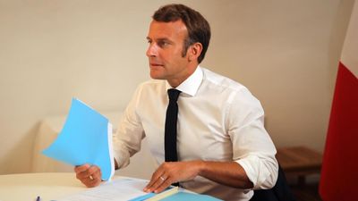 French leader takes a brief working break in Mediterranean stronghold