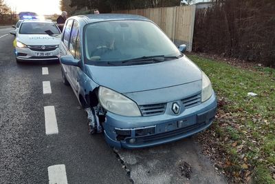 Man stopped by police after being caught driving car with missing wheel