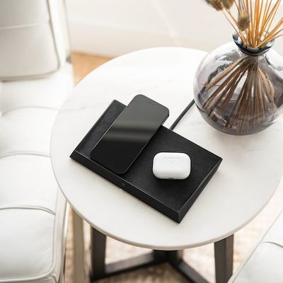 Tesla’s wireless charger feels like a subtle jab at Apple’s failed AirPower