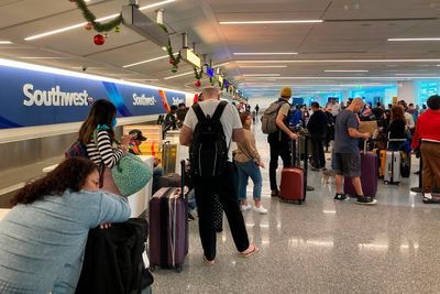 US government to review ‘unacceptable’ cancellations by Southwest Airlines as travel chaos continues