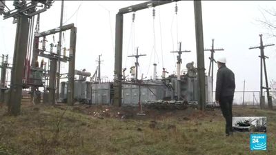 In Ukraine's Kharkiv region, engineers begin reconnecting energy grid in freezing conditions