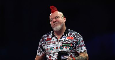 Peter Wright's world title defence falls short with third round exit
