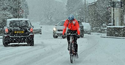 Weather hits hard as Brits returning to work face icy roads, heavy rain and flooding