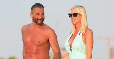 Denise Van Outen soaks up the sun with her new boyfriend at first Christmas together