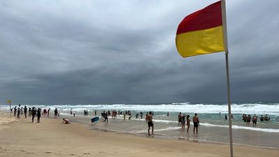 Man drowns, son rescued at Surfers Paradise on the Gold Coast