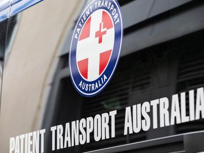 Man charged over woman burnt in front yard