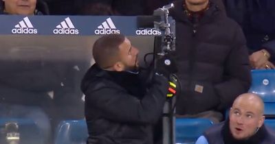 Kyle Walker baffles fans as he breaks TV camera by Man City dugout before dumping it