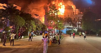 Cambodia hotel fire kills 10 with 'at least 50' trapped as people seen jumping from windows