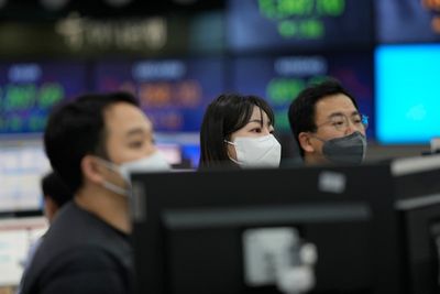 Asian shares extend losses after Wall Street decline