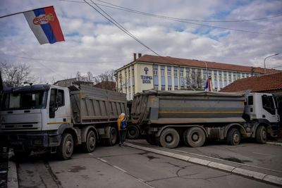 Serbs start removing barricades in easing of tensions in Kosovo