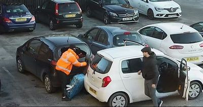 CCTV appeal after men steal catalytic converter from car then smash window