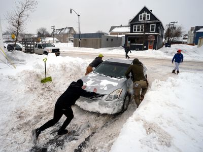 A nearly week-long driving ban is lifted in Buffalo as temperatures rise