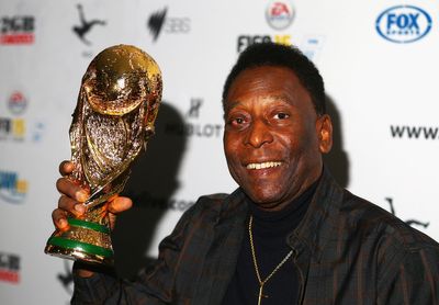 Football world pays tribute to Pele after three-time World Cup winner’s death