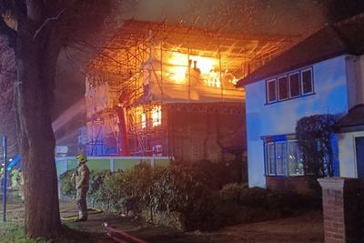 Sixty firefighters battle house fire in Chiswick with top floor alight