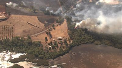 Threat level downgraded for bushfire in Chittering, in Perth's north-east