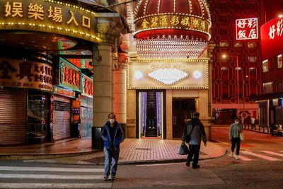 Few tourists, deserted streets in casino hub Macau after reopening