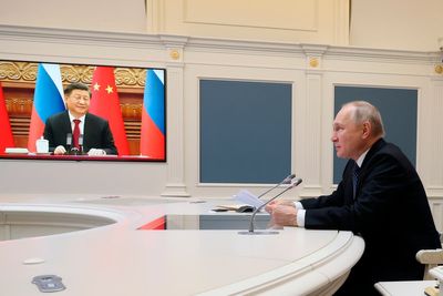 Putin, Xi hold talks and vow to deepen ties