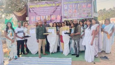 Seeking jobs on compassionate grounds, Chhattisgarh shikshakarmis' kin get heads shaved; donate hair to CM, ministers