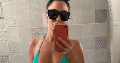N-Dubz's Tulisa stuns in green bikini as she sees in New Year on Thailand beach break