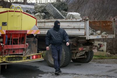 Kosovo opens all border crossings as Serbs remove roadblocks