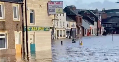 Heavy flooding leaves streets in Dumfries submerged in water as police urge public to avoid area