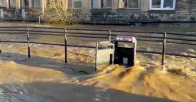 Edinburgh's Water of Leith pathway flooded after severe rain fall batters capital